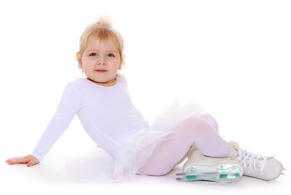 Charming little skater skates sitting on the floor. — Stock Photo, Image