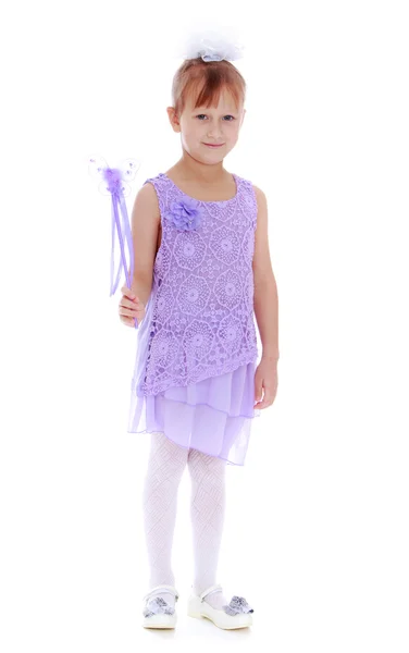 Funny little girl with a magic wand. — Stock Photo, Image