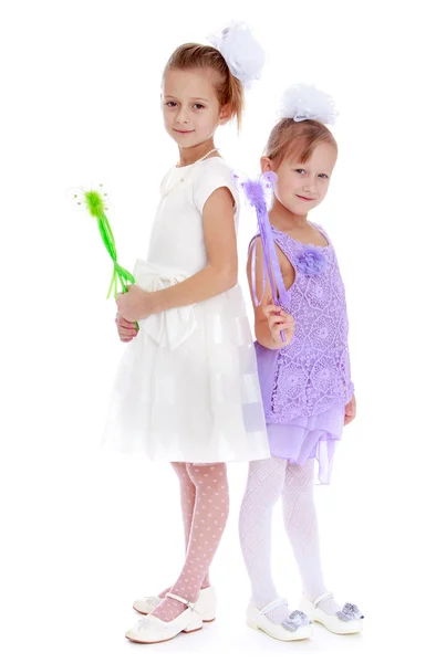 Sisters fun with magic wand — Stock Photo, Image