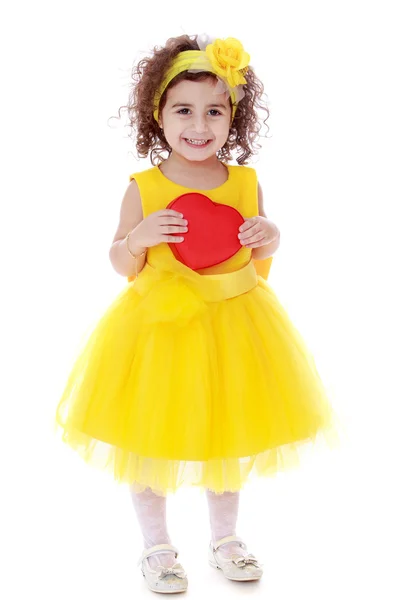 Menina elegante em um vestido amarelo — Fotografia de Stock