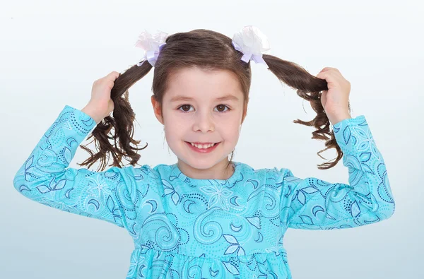 Girl with pigtails — Stock Photo, Image