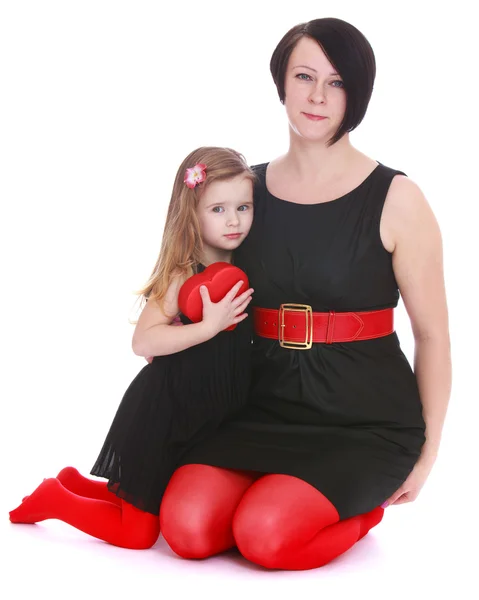 Stylish Mom and daughter in beautiful costumes. — Stock Photo, Image