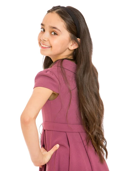 Closeup of elegant girl with long dark hair smiling at the camer — Stock Photo, Image