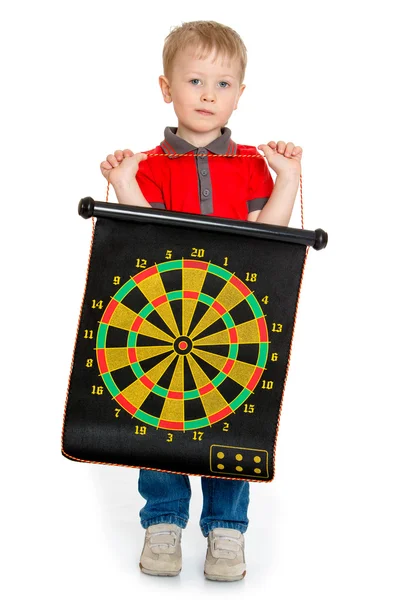 Little boy holding a target for darts — Stock Photo, Image