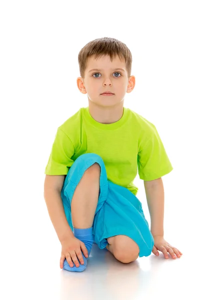 Niño se sentó en una pierna — Foto de Stock