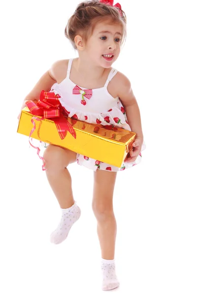A little girl with a big box — Stock Photo, Image