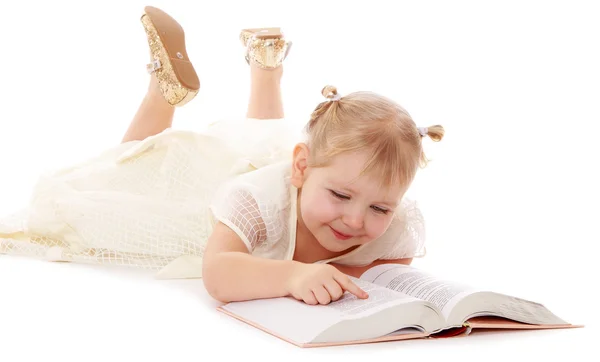 Little girl reading a book — Stock Photo, Image