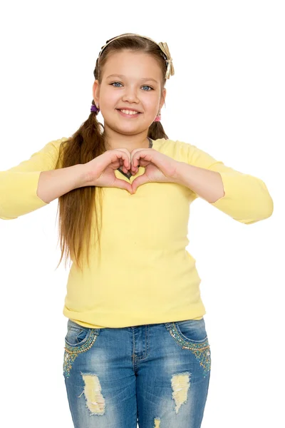 Dziewczyna złożone ręce serce — Zdjęcie stockowe