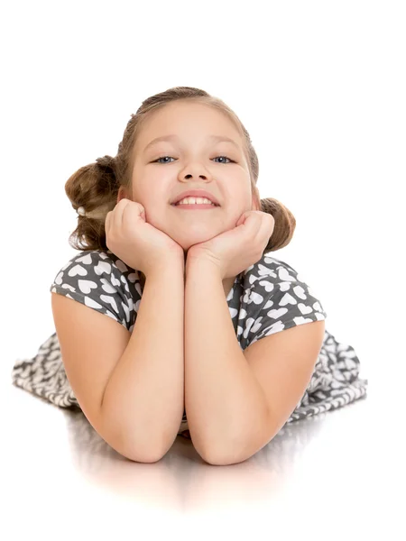 The girl lies on the floor — Stock Photo, Image