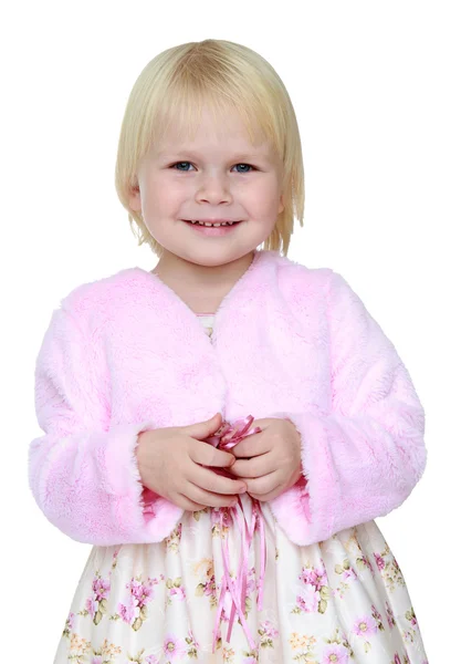 Kleine blonde in roze — Stockfoto
