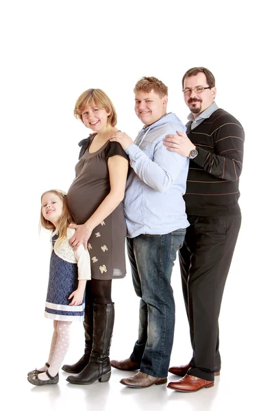 Cheerful family mom dad brother and a little sister. — Stock Photo, Image