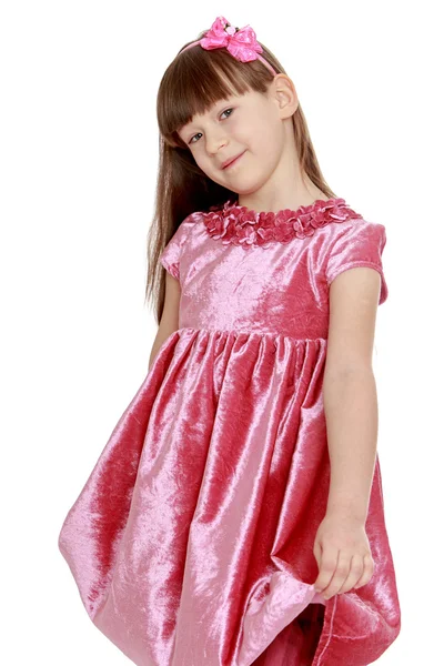 Portrait of little blond in red velvet dress — Stock Photo, Image