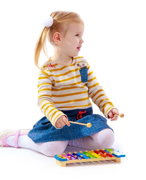 Blond little girl sitting — Stock Photo, Image