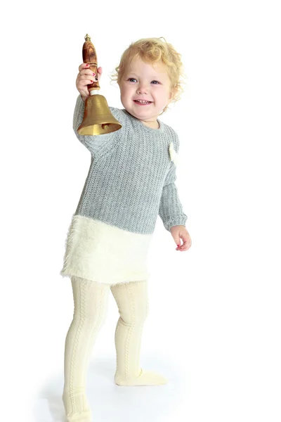 Muy divertida niña sosteniendo gran campana —  Fotos de Stock