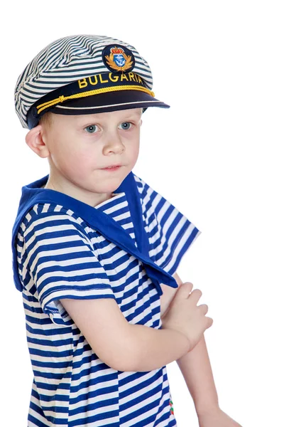 Маленький мальчик в полосатой одежде моряка, и морской шапке — стоковое фото