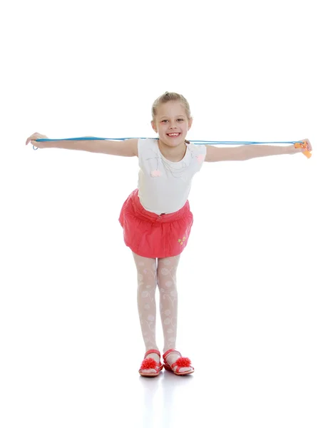 Funny girl in a pink skirt — Stock Photo, Image