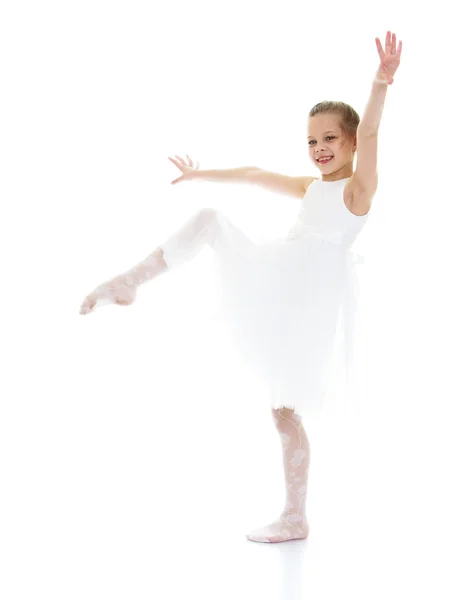 Ballerina child raised her leg up and pulling sock — Stock Photo, Image