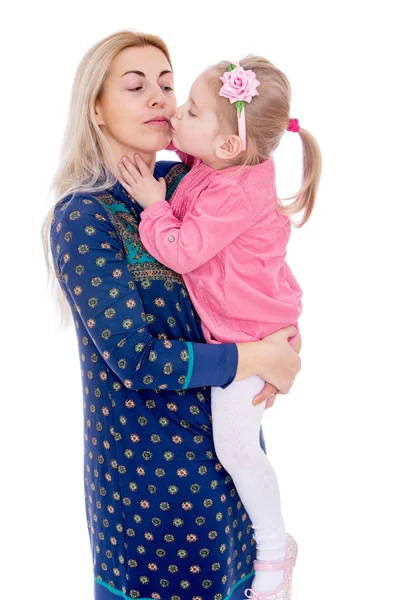 Adorable little girl sitting on his mother — Stock Photo, Image