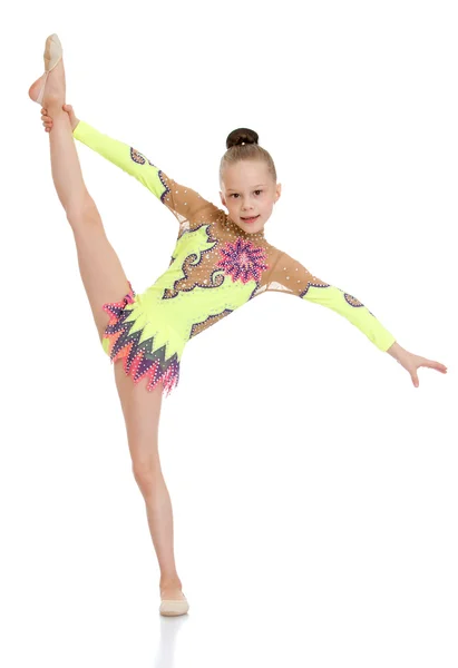 Gymnastka dívka dělá rozdělení — Stock fotografie