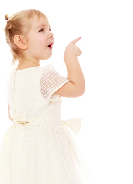 Funny little girl points — Stock Photo, Image