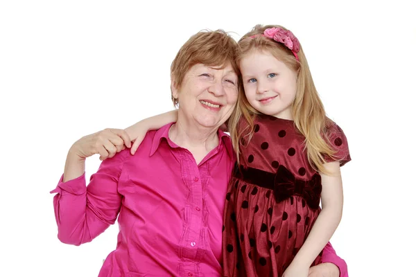 Happy grandmother hugs her favourite grandchild , close-up — Stock Photo, Image