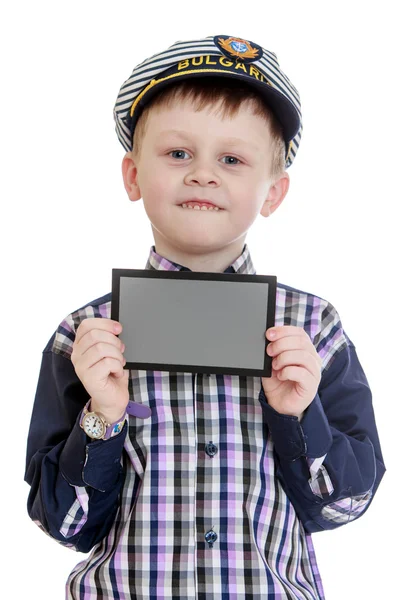 De kleine jongen houdt — Stockfoto