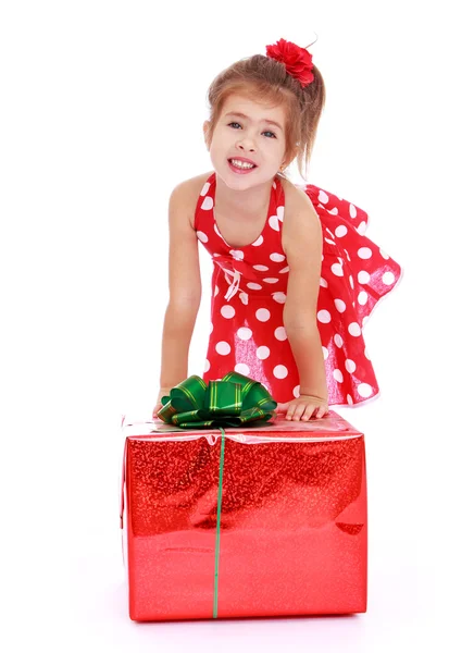 Beautiful Caucasian girl in a red polka dot — Stock Photo, Image