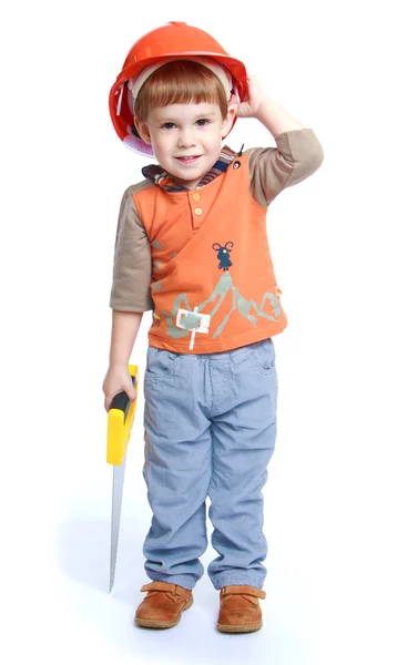 Niño sosteniendo una sierra — Foto de Stock