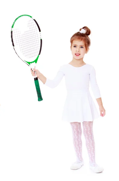 Little girl with a tennis racket in his hand — Stock Fotó