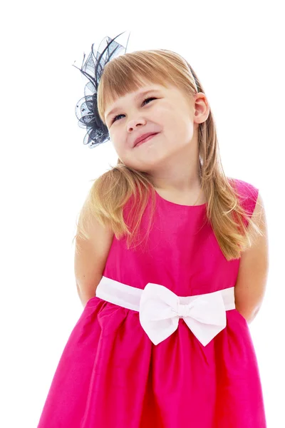 Adorable little girl in a red dress , close-up — Stockfoto