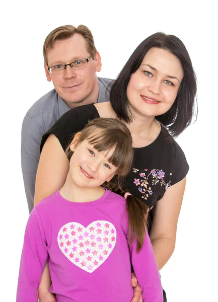 Onnellinen perhe tytär seitsemän vuotta vanha, isä ja äiti, lähikuva — kuvapankkivalokuva