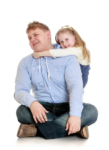 Younger sister hugs her beloved older brother — Stock Photo, Image