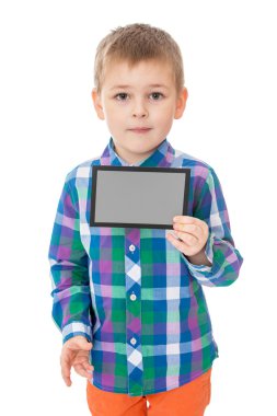 little boy shows a rectangular gray card