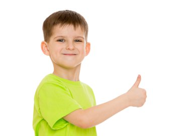 Boy smiling making the hand gesture moves or hitchhiking