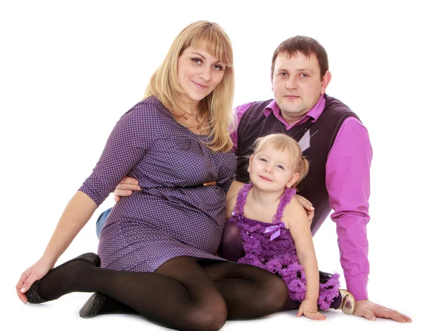 Pregnant mom with her family — Stock Photo, Image