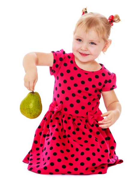 Girl in garden collects pears — Stok fotoğraf