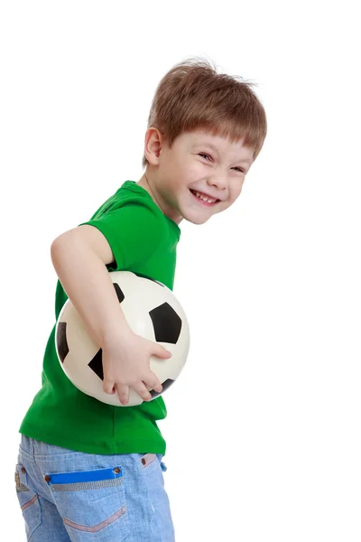 Chico divertido sosteniendo una pelota de fútbol —  Fotos de Stock