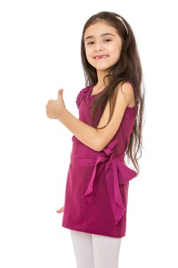 Elegant little dark-haired girl with long hair in a short fashio