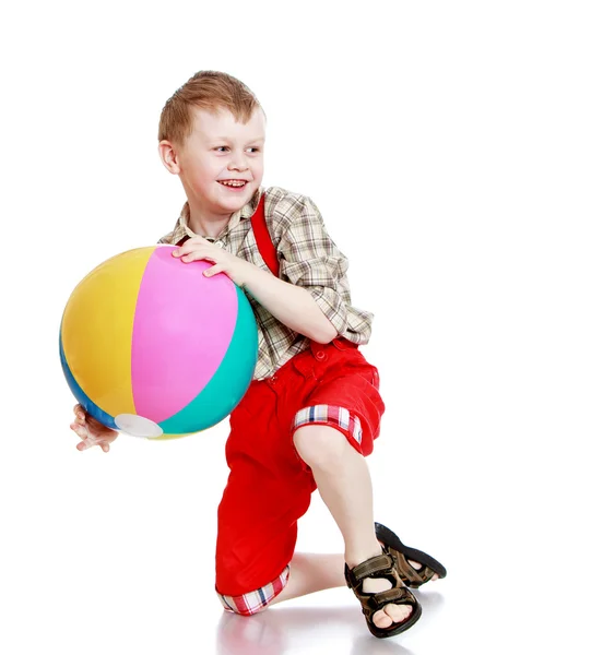 Cheerful little boy in a plaid shirt — Φωτογραφία Αρχείου