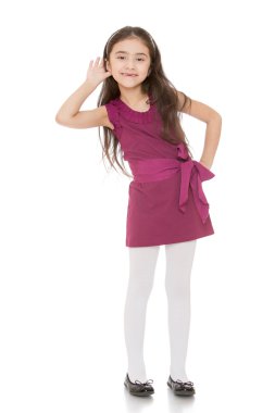 Fashionable little girl with long dark hair  clipart