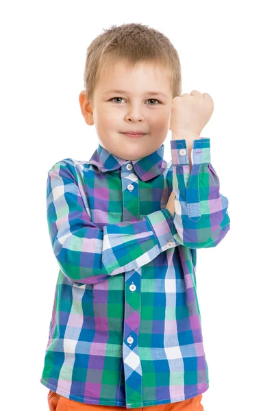 Beautiful fair-haired little boy in the joke shows a fist, close — Zdjęcie stockowe
