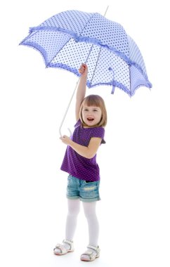 Funny little girl in short denim