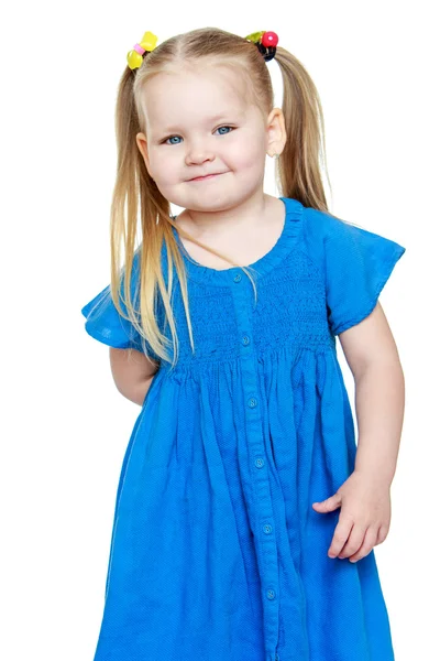 Adorable little round-faced girl with long blonde tails — Stock Photo, Image