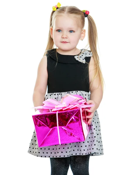 The little blonde girl holding a box — Stock Photo, Image