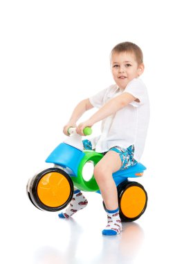 Cheerful little boy in a white shirt er