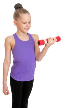 The girl shakes her biceps