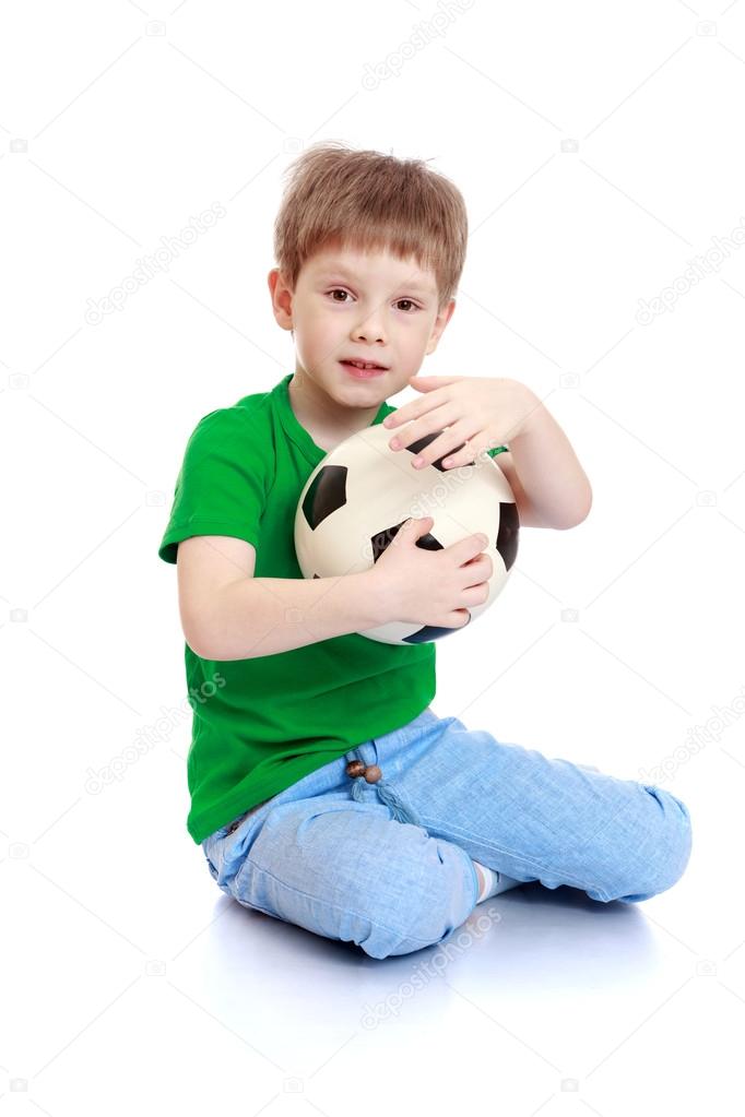 little boy with a soccer ball