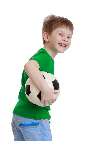 Bambino con un pallone da calcio — Foto Stock