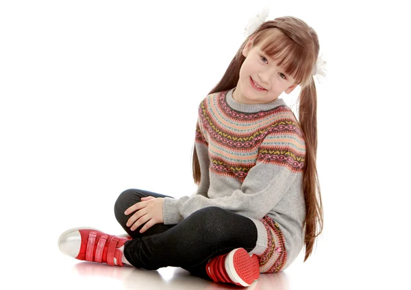 Beautiful girl with long pigtails — Stock Photo, Image