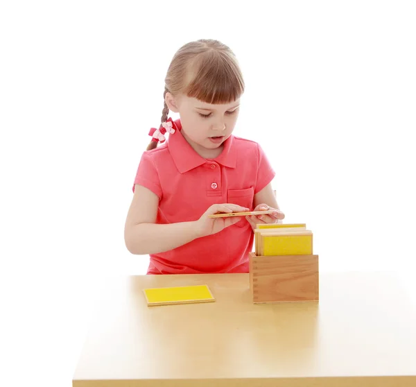 Little girl in a Montessori kindergarten — Stock fotografie